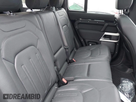 2022 Land Rover Defender SE z VIN SALEPERU2N2088316, wystawiony jako IAAI lot #42151109 z przebiegiem 26 438 mil mil oraz . Historia ofert i sprzedaży dostępna na DreamBid. Obrazek 8.