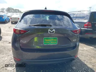 2019 Mazda CX-5 Grand Touring with VIN JM3KFBDM7K0619379, listed as a IAAI auction lot 42007107 with 209,590 mi miles. Bid and sale history available at carsss.com. Image 16.