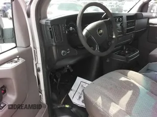 2013 Chevrolet Express Cargo Van with VIN 1GCSGAFX3D1133172, listed as a IAAI auction lot 42140107 with 94,706 mi miles. Bid and sale history available at carsss.com. Image 1.
