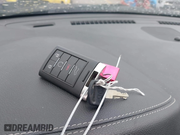 2013 Cadillac SRX Performance Collection z VIN 3GYFNHE35DS569528, wystawiony jako IAAI lot #42329652 z przebiegiem 97 184 mil mil oraz . Historia ofert i sprzedaży dostępna na DreamBid. Obrazek 11.