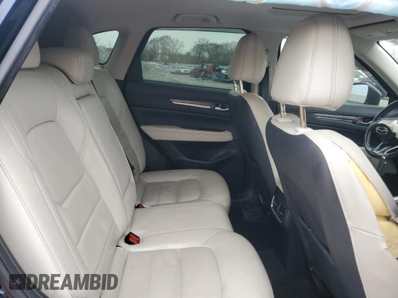 2017 Mazda CX-5 Grand Touring with VIN JM3KFADL3H0125143, listed as a Copart auction lot 50178005 with 160,058 mi miles and Salvage Title. Bid and sale history available at carsss.com. Image 12.