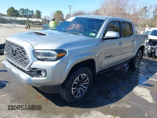 2023 Toyota Tacoma 4WD SR with VIN 3TYCZ5AN7PT122067, listed as a IAAI auction lot 41624047 with 27,483 mi miles. Bid and sale history available at carsss.com. Image 17.