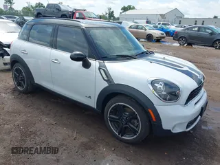 2012 MINI Countryman S with VIN WMWZC5C53CWL61062, listed as a IAAI auction lot 42741657 with 117,106 mi miles and . Bid and sale history available at DreamBid. Image 1.