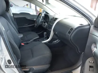 2009 Toyota Corolla with VIN 2T1BU40E59C150365, listed as a IAAI auction lot 42185131 with 179,912 mi miles. Bid and sale history available at carsss.com. Image 5.