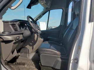 2023 Ford Transit Cargo with VIN 1FTRU8XGXPKC05787, listed as a Copart auction lot 59768665 with 24,845 mi miles and Salvage title. Bid and sale history available at DreamBid. Image 7.