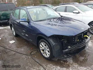 2014 BMW X1 xDrive28i with VIN WBAVL1C55EVY10581, listed as a IAAI auction lot 41344904 with 99,008 mi miles. Bid and sale history available at carsss.com. Image 1.