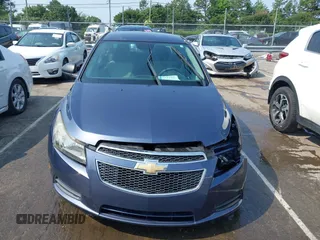 2014 Chevrolet Cruze LS z VIN 1G1PA5SG1E7203604, wystawiony jako IAAI lot #42381528 z przebiegiem 83 079 mil mil oraz . Historia ofert i sprzedaży dostępna na DreamBid. Obrazek 13.