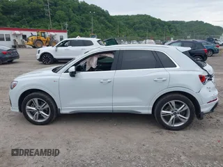 2022 Audi Q3 S line Premium Plus with VIN WA1EECF38N1031860, listed as a IAAI auction lot 42345075 with 27,171 mi miles and . Bid and sale history available at DreamBid. Image 14.