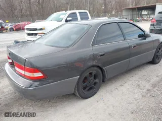 2000 Lexus ES 300 with VIN JT8BF28G6Y5083421, listed as a IAAI auction lot 41627556 with 192,531 mi miles. Bid and sale history available at carsss.com. Image 4.