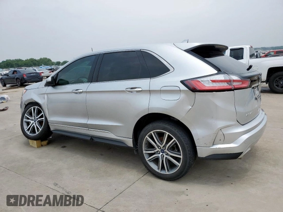 2019 Ford Edge Titanium z VIN 2FMPK3K99KBC19512, wystawiony jako Copart lot #56512305 z przebiegiem 94 107 mil mil oraz Szkoda całkowita • Salvage title. Historia ofert i sprzedaży dostępna na DreamBid. Obrazek 2.