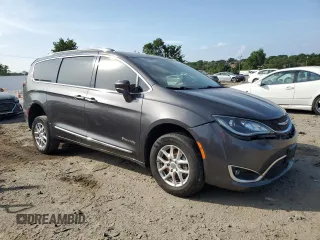 2020 Chrysler Pacifica Touring L with VIN 2C4RC1BG5LR124953, listed as a Copart auction lot 59874695 with 67,855 mi miles and Salvage title. Bid and sale history available at DreamBid. Image 4.