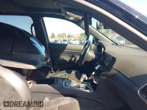 2020 Jeep Grand Cherokee Laredo E with VIN 1C4RJFAG8LC315568, listed as a IAAI auction lot 39783198 with 33,368 mi miles and . Bid and sale history available at DreamBid. Image 5.