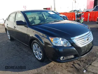 2009 Toyota Avalon XL with VIN 4T1BK36B69U325444, listed as a IAAI auction lot 41403510 with 134,958 mi miles. Bid and sale history available at carsss.com. Image 1.