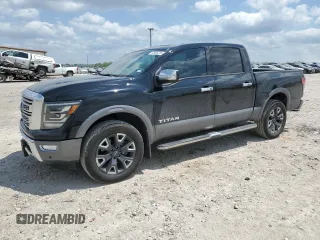 2023 Nissan Titan Platinum Reserve with VIN 1N6AA1EDXPN106467, listed as a Copart auction lot 53455215 with 56,061 mi miles and Salvage title. Bid and sale history available at DreamBid. Image 1.