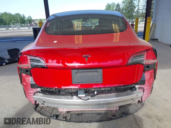 2020 Tesla Model 3 Standard Range Plus z VIN 5YJ3E1EA7LF611669, wystawiony jako IAAI lot #42179974 z przebiegiem 17 696 mil mil oraz . Historia ofert i sprzedaży dostępna na DreamBid. Obrazek 6.