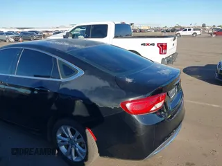 2015 Chrysler 200 Limited with VIN 1C3CCCAB9FN632906, listed as a IAAI auction lot 41418163 with 181,428 mi miles. Bid and sale history available at carsss.com. Image 6.
