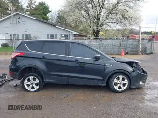 2013 Ford Escape SE with VIN 1FMCU9GX9DUD34661, listed as a IAAI auction lot 41945565 with 239,752 mi miles and . Bid and sale history available at DreamBid. Image 13.