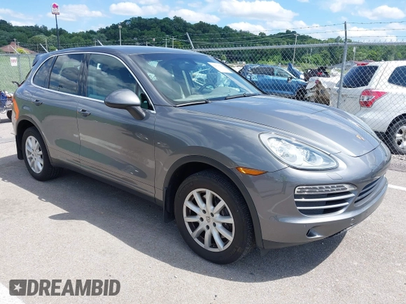 2014 Porsche Cayenne z VIN WP1AA2A2XELA91523, wystawiony jako IAAI lot #42538298 z przebiegiem 67 001 mil mil oraz . Historia ofert i sprzedaży dostępna na DreamBid. Obrazek 1.