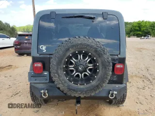 1999 Jeep Wrangler Sport with VIN 1J4FY19S9XP423684, listed as a Copart auction lot 55079455 with 149,756 mi miles and Salvage Title. Bid and sale history available at carsss.com. Image 6.