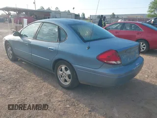2006 Ford Taurus SE with VIN 1FAFP53U26A179541, listed as a IAAI auction lot 42000612 with 214,881 mi miles. Bid and sale history available at carsss.com. Image 3.