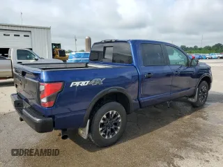 2020 Nissan Titan SL с VIN 1N6AA1ED2LN505013, выставлен на аукционе Copart как лот 56933185 с пробегом 91 342 миль миль и Списание • Salvage title. История ставок и продаж доступна на DreamBid. Изображение 3.