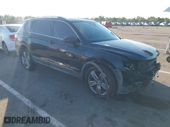 2018 Volkswagen Tiguan SEL Premium with VIN 3VV5B7AX1JM002585, listed as a IAAI auction lot 40495823 with 82,376 mi miles and . Bid and sale history available at DreamBid. Image 1.