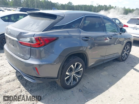 2016 Lexus RX 450h z VIN 2T2BGMCAXGC005914, wystawiony jako IAAI lot #42156530 z przebiegiem 94 050 mil mil oraz . Historia ofert i sprzedaży dostępna na DreamBid. Obrazek 4.
