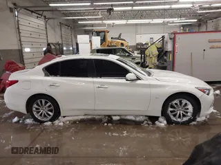 2015 Infiniti Q50 Premium z VIN JN1BV7AR0FM417283, wystawiony jako IAAI lot #41579549 z przebiegiem 112 407 mil mil oraz . Historia ofert i sprzedaży dostępna na DreamBid. Obrazek 14.