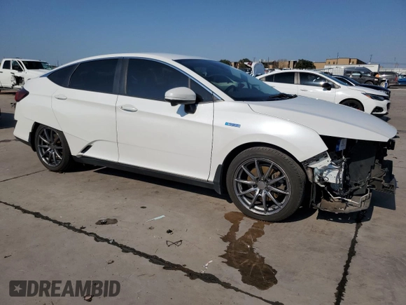 2018 Honda Clarity Plug-In Hybrid with VIN JHMZC5F15JC021839, listed as a Copart auction lot 66439674 with 95,903 mi miles and Clean Title. Bid and sale history available at carsss.com. Image 4.