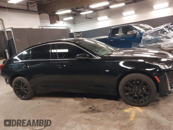 2023 Cadillac CT5 Luxury z VIN 1G6DX5RK7P0135813, wystawiony jako IAAI lot #42130722 z przebiegiem 20 738 mil mil oraz . Historia ofert i sprzedaży dostępna na DreamBid. Obrazek 14.