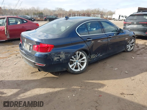 2015 BMW 5 Series 535i with VIN WBA5B1C58FG127959, listed as a IAAI auction lot 41571017 with 122,274 mi miles and . Bid and sale history available at carsss.com. Image 4.