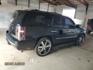 2010 Chevrolet Tahoe LTZ with VIN 1GNUKCE05AR236038, listed as a Copart auction lot 63033425 with 132,236 mi miles and Salvage title. Bid and sale history available at DreamBid. Image 3.