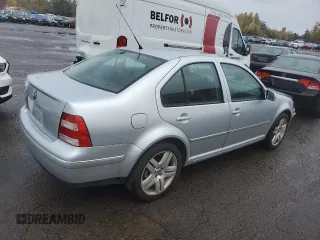 2004 Volkswagen Jetta GL z VIN 3VWRK69M54M030184, wystawiony jako Copart lot #77764124 z przebiegiem 97 634 mil mil oraz Szkoda całkowita • Salvage title. Historia ofert i sprzedaży dostępna na DreamBid. Obrazek 3.