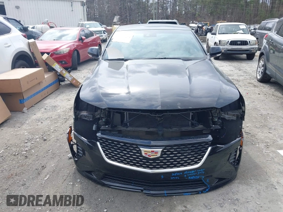 2024 Cadillac CT4 Luxury z VIN 1G6DA5RK6R0129036, wystawiony jako IAAI lot #41787673 z przebiegiem 2 051 mil mil oraz . Historia ofert i sprzedaży dostępna na DreamBid. Obrazek 13.