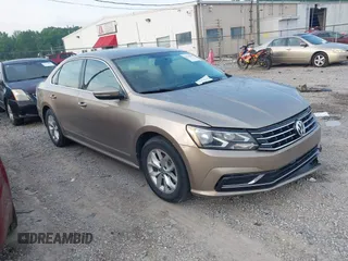 2016 Volkswagen Passat S with VIN 1VWAT7A39GC039477, listed as a IAAI auction lot 42132839 with 189,966 mi miles and . Bid and sale history available at DreamBid. Image 1.
