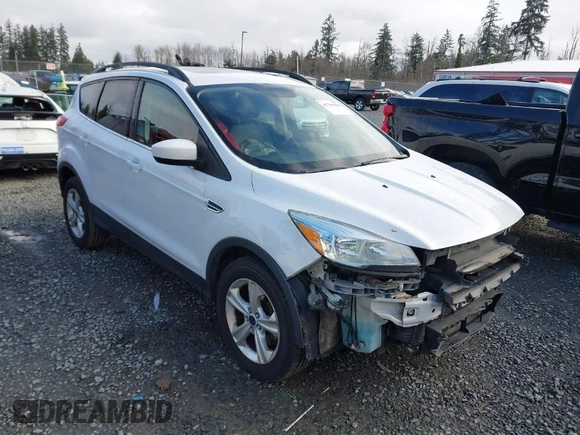 2016 Ford Escape SE z VIN 1FMCU9G96GUC15858, wystawiony jako IAAI lot #41799156 z przebiegiem 162 033 mil mil oraz . Historia ofert i sprzedaży dostępna na DreamBid. Obrazek 1.