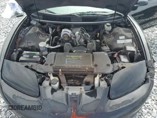 1998 Pontiac Firebird Firebird z VIN 2G2FS22K2W2216667, wystawiony jako Copart lot #63143015 z przebiegiem 107 097 mil mil oraz Szkoda całkowita • Salvage title. Historia ofert i sprzedaży dostępna na DreamBid. Obrazek 11.