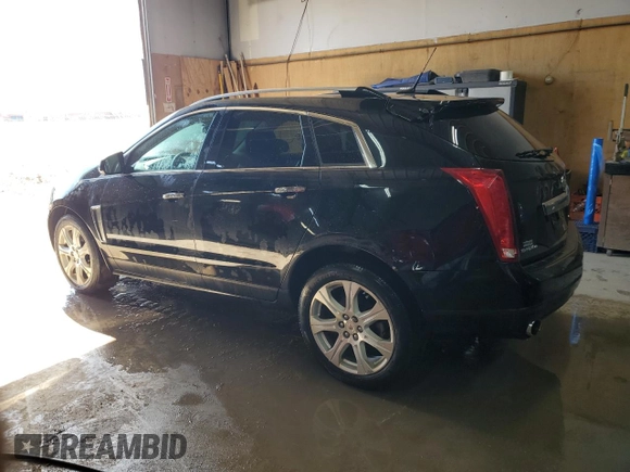 2014 Cadillac SRX Performance Collection z VIN 3GYFNFE31ES627978, wystawiony jako Copart lot #55437185 z przebiegiem 141 759 mil mil oraz Czysty tytuł • Clean title. Historia ofert i sprzedaży dostępna na DreamBid. Obrazek 2.