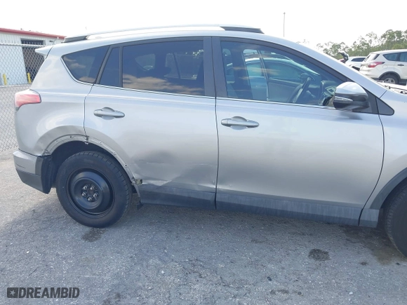 2016 Toyota RAV4 XLE with VIN 2T3WFREV7GW280362, listed as a IAAI auction lot 42023972 with 160,651 mi miles. Bid and sale history available at carsss.com. Image 6.