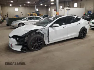 2023 Tesla Model S z VIN 5YJSA1E5XPF520265, wystawiony jako Copart lot #54833255 z przebiegiem 16 502 mil mil oraz Szkoda całkowita • Salvage title. Historia ofert i sprzedaży dostępna na DreamBid. Obrazek 1.