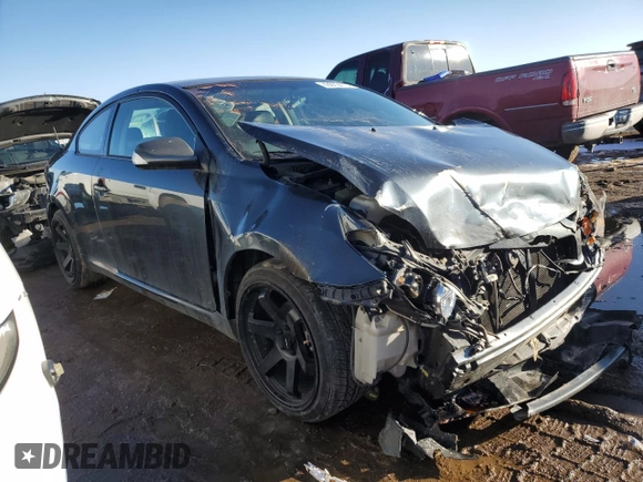 2009 Scion tC with VIN JTKDE167990279631, listed as a Copart auction lot 43079415 with 185,882 mi miles and Salvage Title. Bid and sale history available at carsss.com. Image 4.