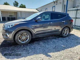 2018 Hyundai Santa Fe 2.4L with VIN 5XYZTDLB5JG555606, listed as a Copart auction lot 64206545 with 104,596 mi miles and Clean title. Bid and sale history available at DreamBid. Image 1.