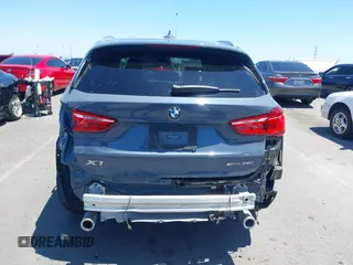 2021 BMW X1 sDrive28i z VIN WBXJG7C02M5T37169, wystawiony jako IAAI lot #42226396 z przebiegiem 48 603 mil mil oraz . Historia ofert i sprzedaży dostępna na DreamBid. Obrazek 17.