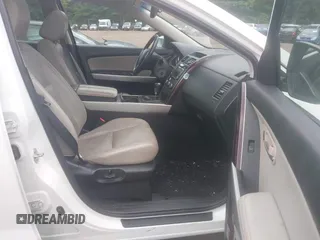 2013 Mazda CX-9 Grand Touring z VIN JM3TB2DA6D0414080, wystawiony jako IAAI lot #42310153 z przebiegiem 190 991 mil mil oraz . Historia ofert i sprzedaży dostępna na DreamBid. Obrazek 5.