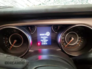 2023 Jeep Gladiator Sport S z VIN 1C6HJTAG0PL523306, wystawiony jako Copart lot #59236535 z przebiegiem 64 185 mil mil oraz Szkoda całkowita • Salvage title. Historia ofert i sprzedaży dostępna na DreamBid. Obrazek 9.