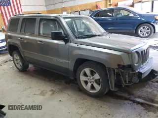 2014 Jeep Patriot Latitude with VIN 1C4NJRFBXED546921, listed as a Copart auction lot 61032895 with 133,344 mi miles and Clean title. Bid and sale history available at DreamBid. Image 4.