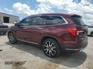 2019 Honda Pilot Touring 7-Passenger with VIN 5FNYF6H6XKB094020, listed as a Copart auction lot 61460255 with 135,149 mi miles and Salvage title. Bid and sale history available at DreamBid. Image 2.