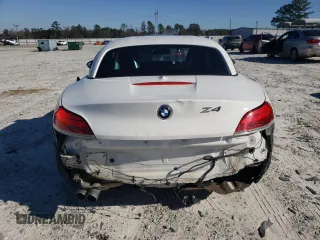 2011 BMW Z4 sDrive30i with VIN WBALM5C5XBE379064, listed as a Copart auction lot 87475414 with 105,420 mi miles and Salvage Title. Bid and sale history available at carsss.com. Image 6.