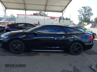 2018 Nissan Maxima SL with VIN 1N4AA6AP4JC371488, listed as a IAAI auction lot 42255682 with 96,696 mi miles and . Bid and sale history available at DreamBid. Image 14.