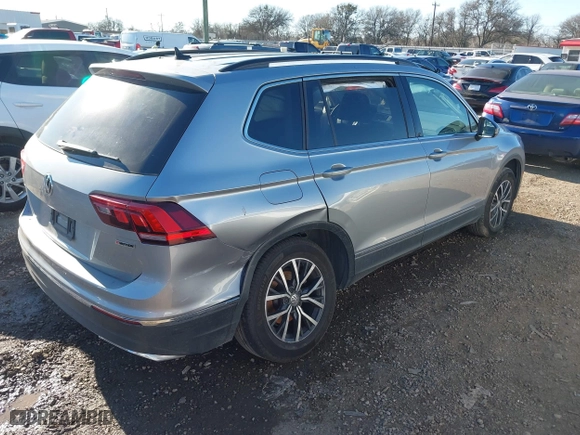2020 Volkswagen Tiguan SE with VIN 3VV2B7AX4LM081188, listed as a IAAI auction lot 41655478 with 63,593 mi miles. Bid and sale history available at carsss.com. Image 4.